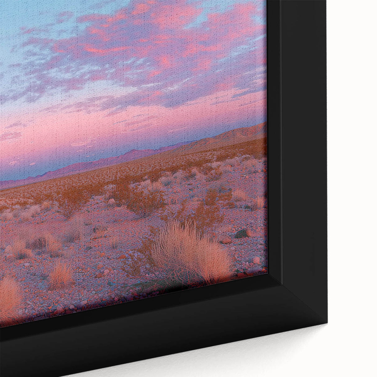 Close-up of a framed canvas artwork depicting a vibrant desert landscape, showcasing rich colors of orange and gold, ideal for home decor and nature enthusiasts.