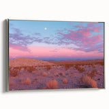 Framed canvas artwork showcasing a stunning desert landscape with warm earthy tones and a silver frame, ideal for enhancing modern home decor.