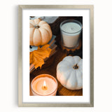 Textured abstract art print with warm autumn hues on a silver framed canvas, ideal for bedroom decor.