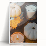 Art deco poster of autumn trees in warm orange and yellow tones, acrylic print framed in white.