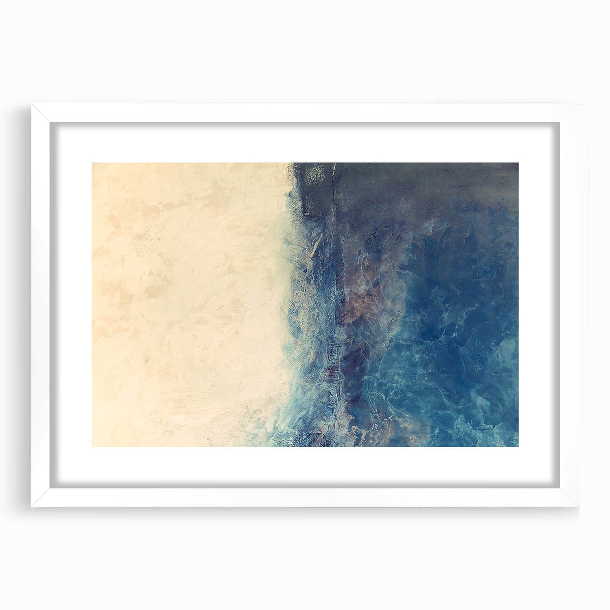 Abstract wall art print featuring vibrant strokes in shades of blue, orange, and yellow, framed with a white mat, enhancing modern interiors with artistic flair.