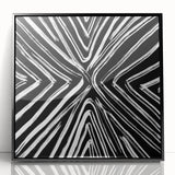 Framed acrylic wall art featuring abstract black strokes on a white background, perfect for modern decor. Ideal for enhancing living spaces or offices.