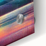 Abstract wall art featuring vibrant, colorful strokes on acrylic glass, showcasing a modern design perfect for contemporary decor. The close-up highlights the texture and depth of the artwork, making it an eye-catching addition to any space.