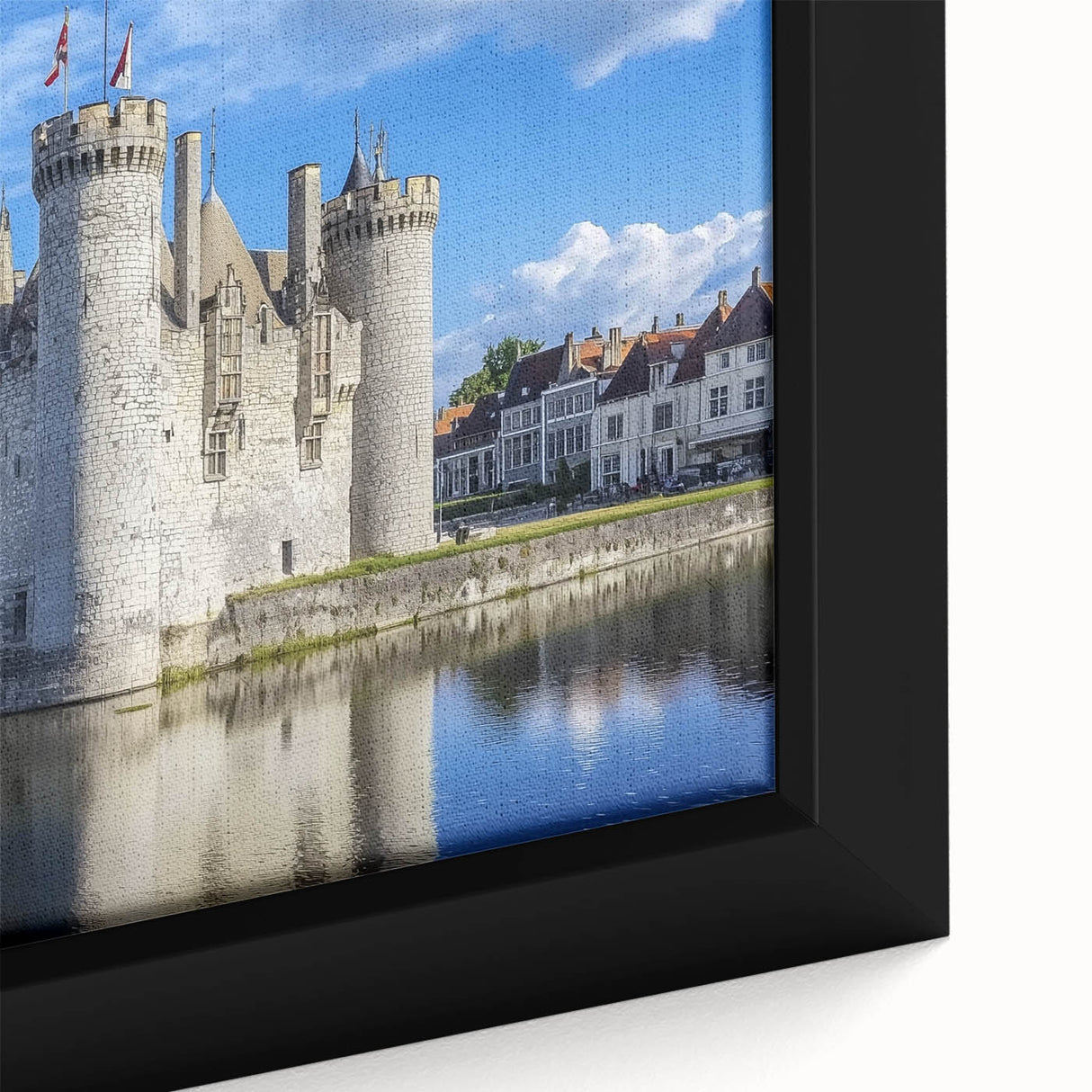 Close-up of a framed canvas artwork depicting a vibrant landscape with a majestic castle, featuring rich colors and intricate details, perfect for home decor.