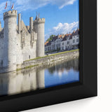 Close-up of a framed canvas artwork depicting a vibrant landscape with a majestic castle, featuring rich colors and intricate details, perfect for home decor.
