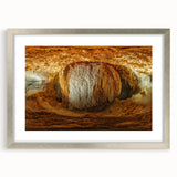 Silver framed landscape artwork featuring caves, highlighted with a white mat, showcasing intricate details and textures, perfect for home or office decor.