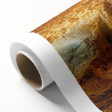 Rolled canvas showcasing a vibrant landscape design with intricate cave formations, perfect for home decor, presented in a protective cardboard tube for shipping.