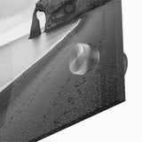 Close-up view of a vibrant acrylic landscape artwork depicting towering cliffs and a dramatic sky, showcasing rich colors and intricate details, ideal for home decor.