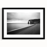 Framed landscape artwork showcasing dramatic cliffs in vibrant colors, with a sleek black mat and frame enhancing the visual appeal, perfect for home decor.