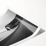 Stunning rolled print of a coastal landscape featuring dramatic cliffs and vibrant blue ocean waves, showcasing detailed textures and colors, perfect for home decor.