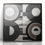 Framed abstract geometric wall art in black acrylic, showcasing sharp angles and modern design elements. Perfect for contemporary home decor.