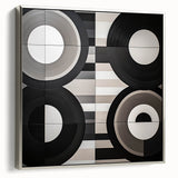 Framed abstract geometric canvas art in silver tones, showcasing sharp angles and modern design elements, ideal for contemporary home decor accents.