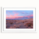 Desert landscape framed artwork with a white mat, showcasing warm earthy tones and detailed textures, ideal for home decor and nature enthusiasts. Perfect for enhancing interior spaces with a serene and inviting atmosphere.