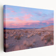 Desert landscape stretched canvas art showcasing vibrant warm tones of reds and yellows, highlighting unique desert formations in a side view display, perfect for home decor.