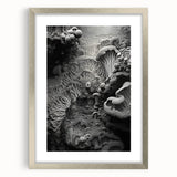 Textured abstract art print in muted earth tones on a framed canvas, ideal for modern bedroom decor.