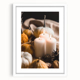 Abstract art print depicting autumnal trees in orange and yellow tones on a white framed canvas.