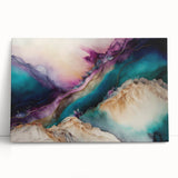 Abstract wall art featuring vibrant strokes in shades of blue, pink, and gold. The stretched canvas leans against a neutral wall, creating a contemporary aesthetic. Perfect for modern home decor.
