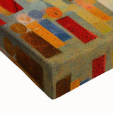 Close-up of vibrant abstract strokes wall art on stretched canvas, showcasing a blend of bold colors including blues, yellows, and reds, perfect for modern home decor.