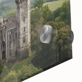 Close-up view of a vibrant acrylic landscape artwork depicting a majestic castle surrounded by lush greenery, highlighting intricate details and vivid colors. Perfect for home decor enthusiasts seeking unique art pieces.