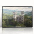 Framed acrylic artwork showcasing a stunning landscape with a majestic castle, featuring a sleek black frame and vibrant colors, perfect for home decor.
