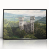 Framed acrylic artwork showcasing a stunning landscape with a majestic castle, featuring a sleek black frame and vibrant colors, perfect for home decor.