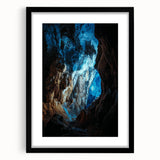 Framed landscape artwork showcasing a cave scene, featuring a sleek black mat and stylish frame, perfect for home decor enthusiasts seeking nature-inspired designs.