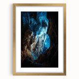 Elegant gold-framed landscape art print featuring a cave scene, enhanced with a white mat for added sophistication, perfect for home decor or gallery display.
