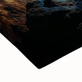 Close-up of a stretched canvas artwork depicting a vibrant landscape scene with intricate cave formations, showcasing rich colors and textures ideal for home decor.