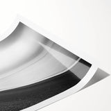 Stunning rolled print showcasing a serene landscape with dramatic cliffs and gentle waves, ideal for home decor, packaged securely in a protective cardboard tube.