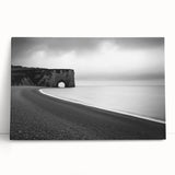 Stretched canvas art depicting a stunning coastal landscape with dramatic cliffs and vibrant blue ocean waves, perfect for modern home decor.