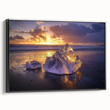 Framed canvas artwork depicting a serene beach landscape with vibrant colors, showcased in a sleek black frame, perfect for home decor.