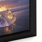 Framed canvas artwork depicting a serene beach landscape with vibrant colors, capturing soft waves and a clear blue sky, perfect for coastal decor enthusiasts.