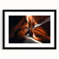 Landscape art print of a canyon scene framed in a sleek black mat, showcasing vibrant colors and intricate details, perfect for enhancing modern home decor.