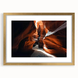 Framed landscape artwork showcasing majestic canyons, featuring a gold mat and elegant detailing, perfect for enhancing home decor with natural beauty.