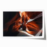 Landscape rolled print showcasing vibrant canyons in rich hues of orange, red, and blue, beautifully capturing the natural beauty of desert formations, ideal for home decor.