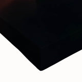 Close-up of a stretched canvas artwork depicting vibrant canyons in earthy tones, showcasing textured details and layered colors, ideal for home decor.