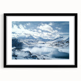 Black frame with a white mat showcasing a serene countryside landscape painting, emphasizing vibrant greens and blues, perfect for home decor.