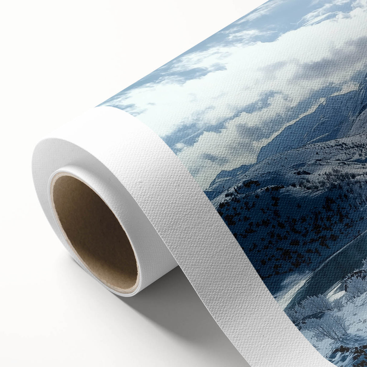 Vibrant rolled canvas artwork showcasing a serene countryside landscape with rolling hills and a clear blue sky, elegantly packaged in a protective cardboard tube.