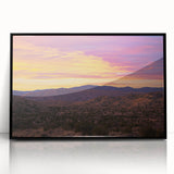 Framed acrylic artwork showcasing a vibrant desert landscape, featuring warm tones of orange and yellow, set in a sleek black frame, perfect for home decor enthusiasts.