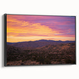 Framed canvas artwork showcasing a stunning desert landscape with vibrant colors and intricate details, featuring a sleek black frame for modern decor.