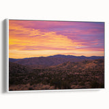 Framed canvas artwork showcasing a serene desert landscape in warm tones, elegantly displayed with a white frame, perfect for home decor enhancement.