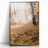 Mid-century modernist art depicting an autumnal forest scene in earthy tones, framed in silver acrylic.