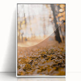 Art deco poster of a stylized autumn tree in vibrant orange and red tones on a white acrylic frame.