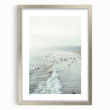 Textured abstract art print in muted blue and gray tones on a framed canvas, suitable for bedroom wall decor.