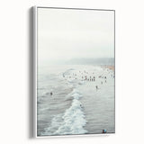 Vintage poster art on a large framed canvas, featuring colorful abstract designs against a black background.