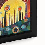 Close-up of a framed canvas wall art featuring vibrant abstract strokes in shades of blue, orange, and yellow, perfect for modern home decor.