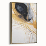 Framed canvas wall art featuring abstract strokes in gold and black, showcasing contemporary design with a modern aesthetic, ideal for enhancing interior decor.