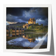 Glossy photo print mockup showcasing a serene landscape of a castle surrounded by lush greenery, ideal for art displays or interior design inspiration.