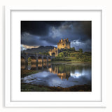 Elegant white-framed landscape artwork showcasing a picturesque castle surrounded by lush greenery, designed to enhance any home decor with its serene beauty.