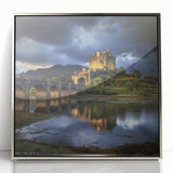 Framed acrylic artwork showcasing a stunning landscape with a majestic castle, featuring a silver frame that enhances the visual appeal and elegance, perfect for home decor.